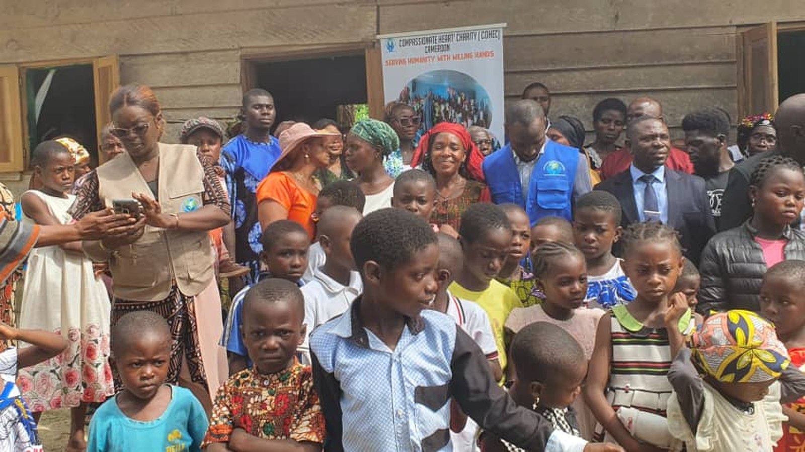 COHEC leaders and volunteers with children